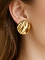 Golden Ripple Statement Stud Earrings - Image 3
